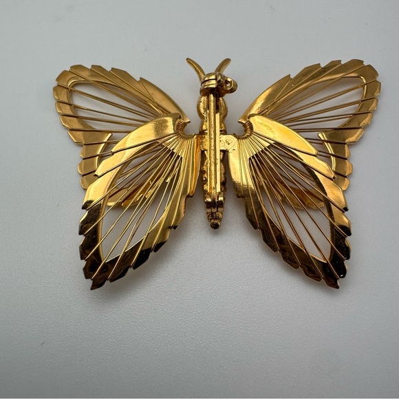 Monet gold-tone metal butterfly brooch filigree or "harp-like" wire wing design - Picture 3 of 5
